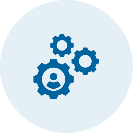 Icon depicting three blue gears, one with a human figure inside, against a light gray circular background.